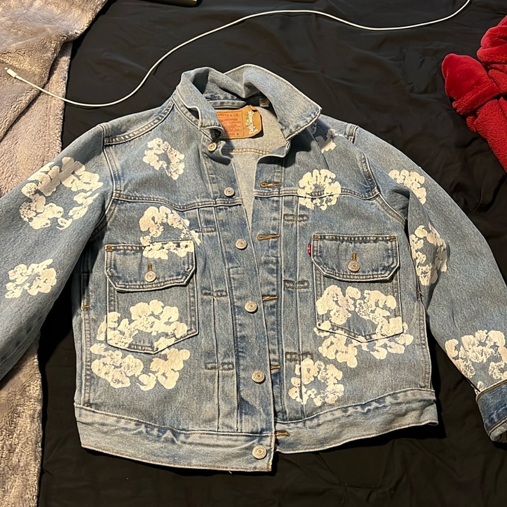 Size Small Deniem Tears Jacket slightly altered in the back for a crop back look